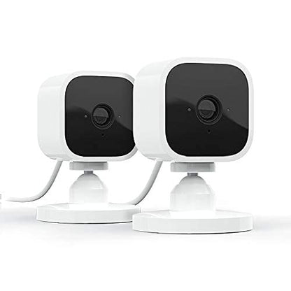 Blink Mini - Compact indoor plug-in smart security camera, 1080p HD video, night vision, motion detection, two-way audio, easy set up, Works with Alexa – 2 cameras (Black)