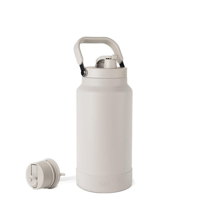 Simple Modern Trek Pivot | Half Gallon Water Bottle Jug with Handle & Boot | Interchangeable Straw & Chug Lids | Large Insulated Stainless Steel | Sports Camping Outdoors | 64oz, Almond Birch