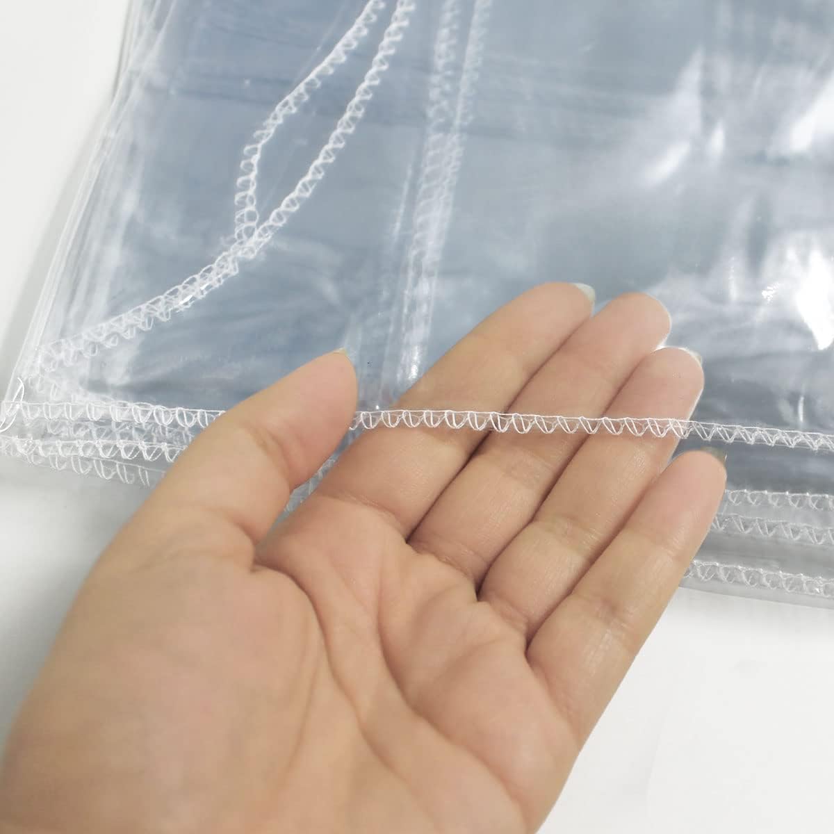 LAMINET Heavy-Duty Deluxe Crystal Clear Vinyl Tablecloth Protector, 70" x 52", Oblong