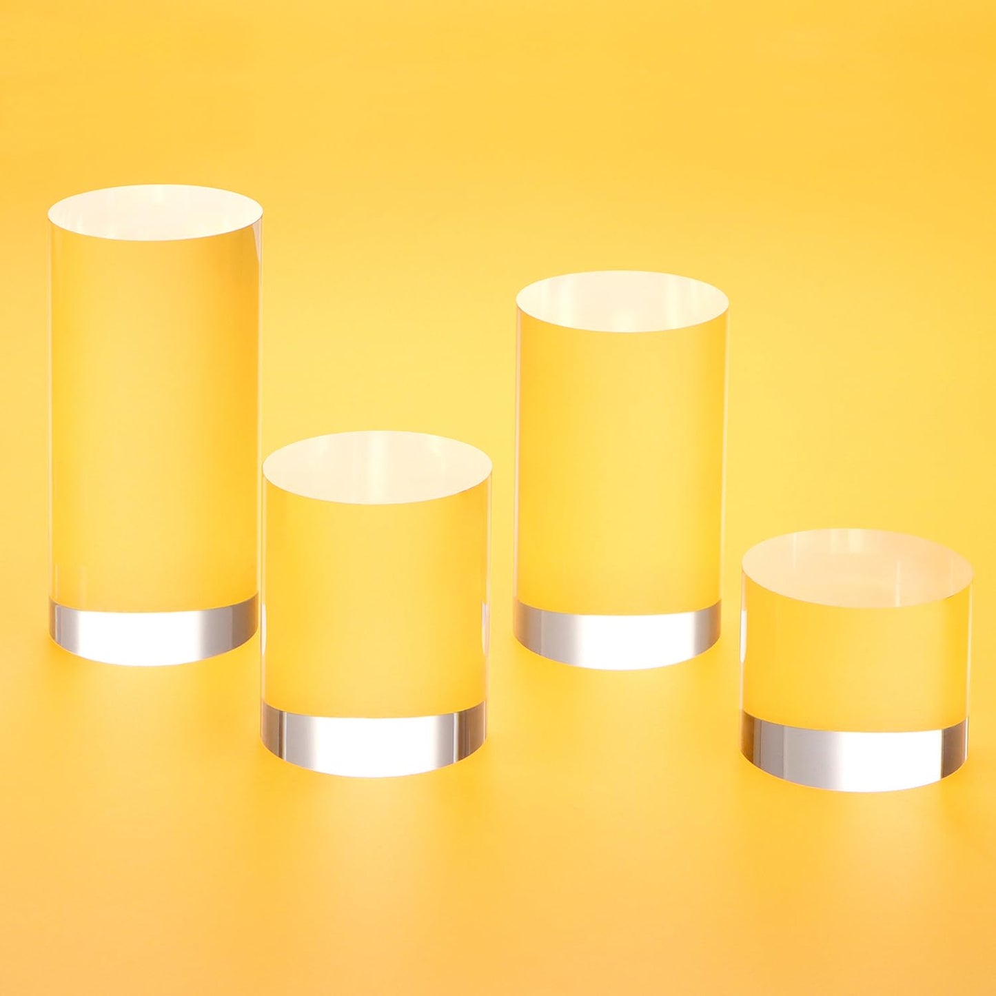 QWORK Acrylic Display Risers - 4-Pack Solid Clear Cylinder Stand Holder for Jewelry, Figures, Perfumes, Small Collectibles - High Transparency & Elegant Design