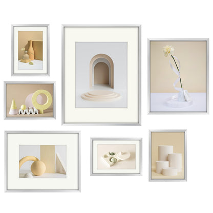 Frametory, Aluminum Picture Frames Set of 7 - Silver Gallery Wall Kit - Display One 11x14, Two 8x10, and Four 5x7 inch Photos for Home Decoration