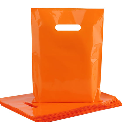 POPGIFTU Orange Plastic Bags with Handles 100 Pack, 9x12 Party Bags Bulk for Events, Halloween Treat Bags, Retail Shopping Bags, Small Business Supplies