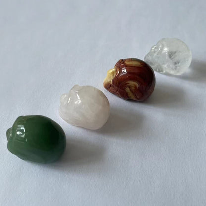Byaning 4Pcs 1" Crystal Skull,Hand Carved Gemstone Skull, Natural Tiger Iron Eye & Rose Quartz & Green Aventurine & Black Obsidian Assorted, Healing Stone Statue