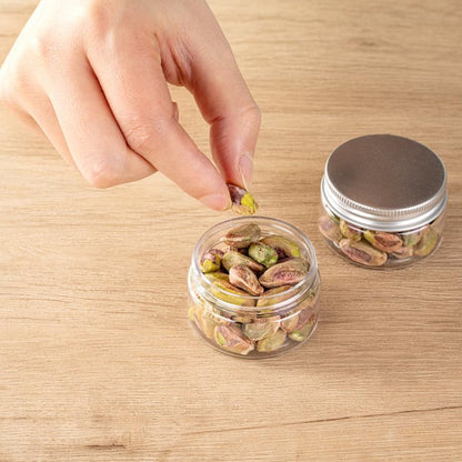 Restaurantware RW Base 1 Ounce Candy Jars 100 Durable Kitchen Storage Containers - Round Airtight Seal Clear Plastic Snack Jars With Silver Aluminum Lids For Table Display Or Candy Buffet