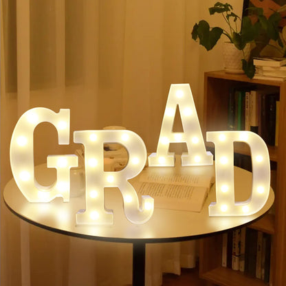 Graduation Decorations 2026 - 4PC Large Light Up Letters GRAD Sign, LED Marquee Letters for Class of 2026 Party Supplies,Kindergarten High School College Senior Decor, Table Wall Centerpiece Backdrop Props