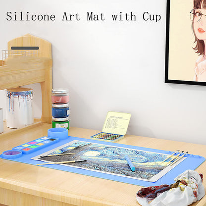2 Pack Silicone Art Mat with Cup, KJMYYXGS Silicone Painting Mat with Cup, 19.7"x11" Silicone Craft Mat with Cup and Paint Holder Silicone Artist Mat Kids (Pink and Blue)