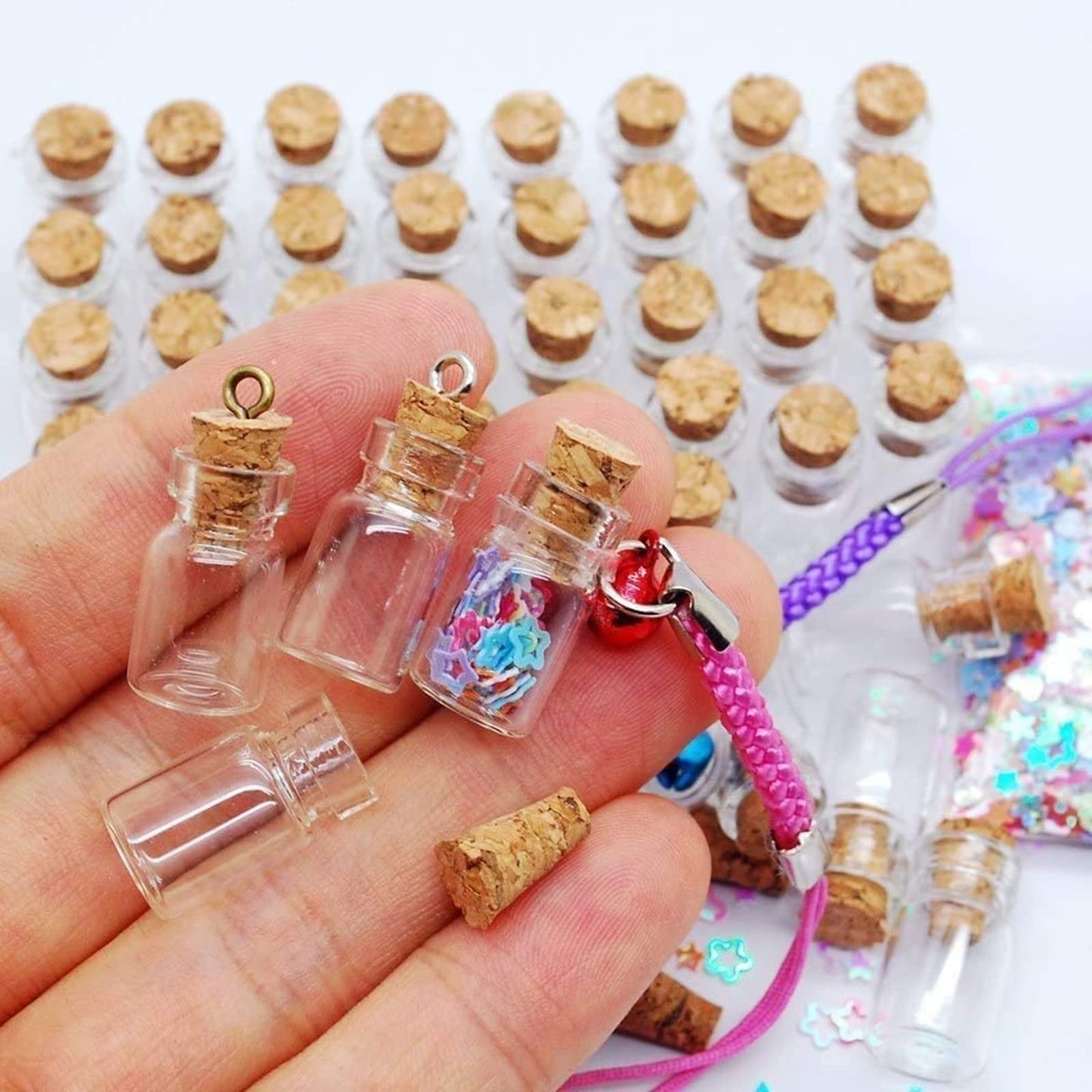 Minsily 100 Pcs 0.5ml Mini Small Glass Bottles with Cork Stoppers 20 Meters Twines Tiny Jars Clear Mini Glass Vials with Eye Screws Corked Bottle DIY Arts Crafts Projects Decoration Party Favors Gifts