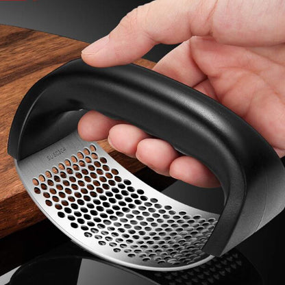 Garlic Press Rocker - Stainless Steel Garlic Crusher with Silicone Peeler and Mini Brush Tools (Black)
