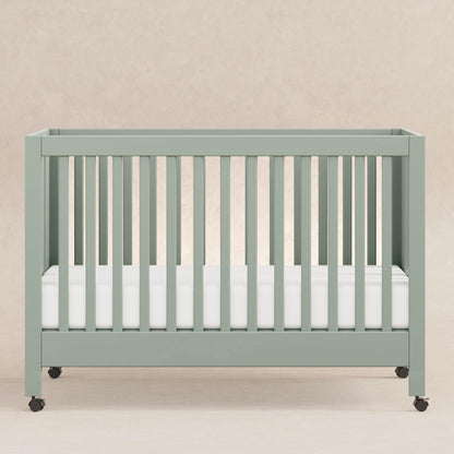 Babyletto Maki Full-Size 2-in-1 Portable Folding Crib with Toddler Bed Conversion Kit in Light Sage, Greenguard Gold Certified