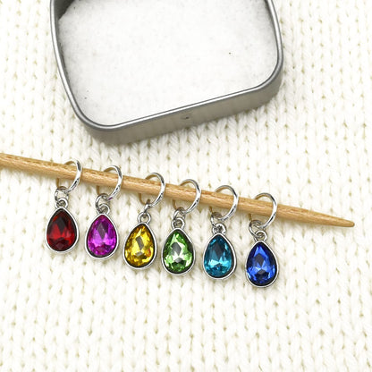 Pretty Warm Designs Rainbow Crystal Drop Stitch Markers for Knitting with Storage Tin - Set of 6 Sparkly Jewel-Tone Charms on Snag-Free Rings - Handmade Yarn Notions