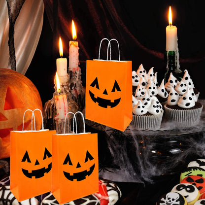 100 Pieces Halloween Pumpkin Gift Bags Trick or Treat Kraft Paper Candy Goodie Bags with Handle for Halloween Party Favors Supplies