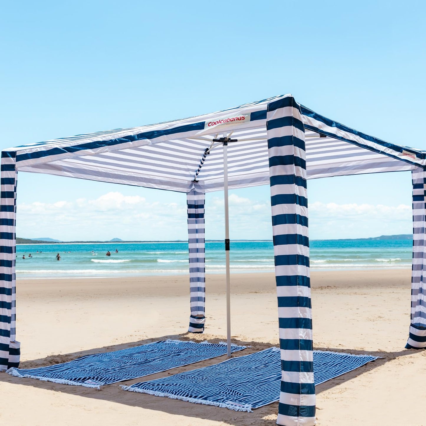 CoolCabana Beach Shade Tent - Easy Setup, UPF 50+ Protection, Large & Medium Sizes, Compact & Wind Resistant - Beach Cabana for The Whole Family - Navy Stripes, Large