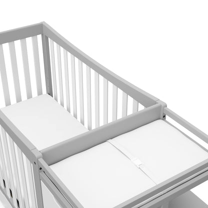 Graco Remi 4-in-1 Convertible Crib & Changer – GREENGUARD Gold Certified, Fits Standard Crib Mattress, Converts to Toddler Bed and Full Bed, 4 Adjustable Mattress Heights (Pebble Gray and White)