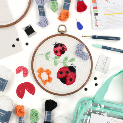 Kimberbell Punch Needle Kit – Bugs & Blooms - Complete DIY Embroidery Kit with Tool, Monks Cloth, Yarn, Appliqué Fabric & Frame – Ladybug & Floral Punch Needle Design for Handmade Gifts & Décor