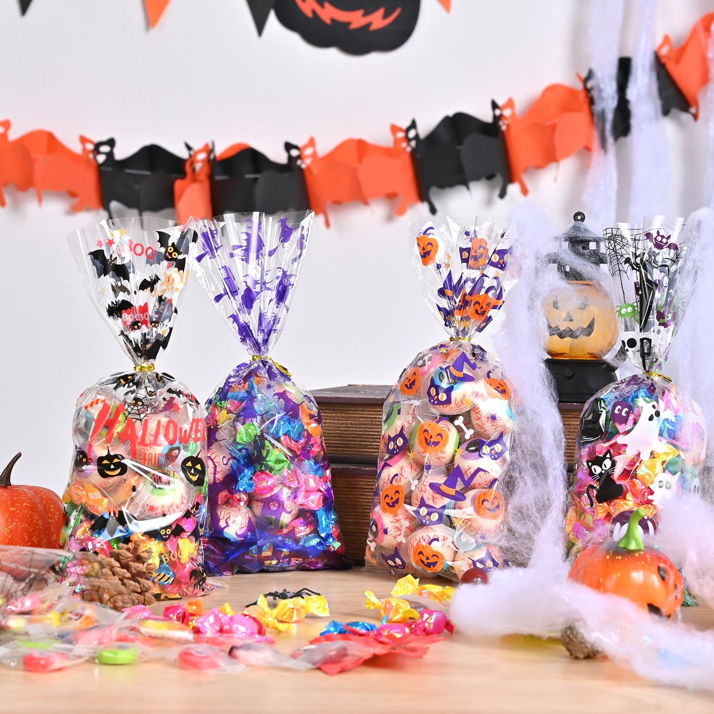 AhfuLife 200PCS Halloween Cellophane Treat Bags, 8 Designs Halloween Clear Candy Bags with Twist Ties for Treat or Treating, Snack Goodie Bags for Party Supplies Favors