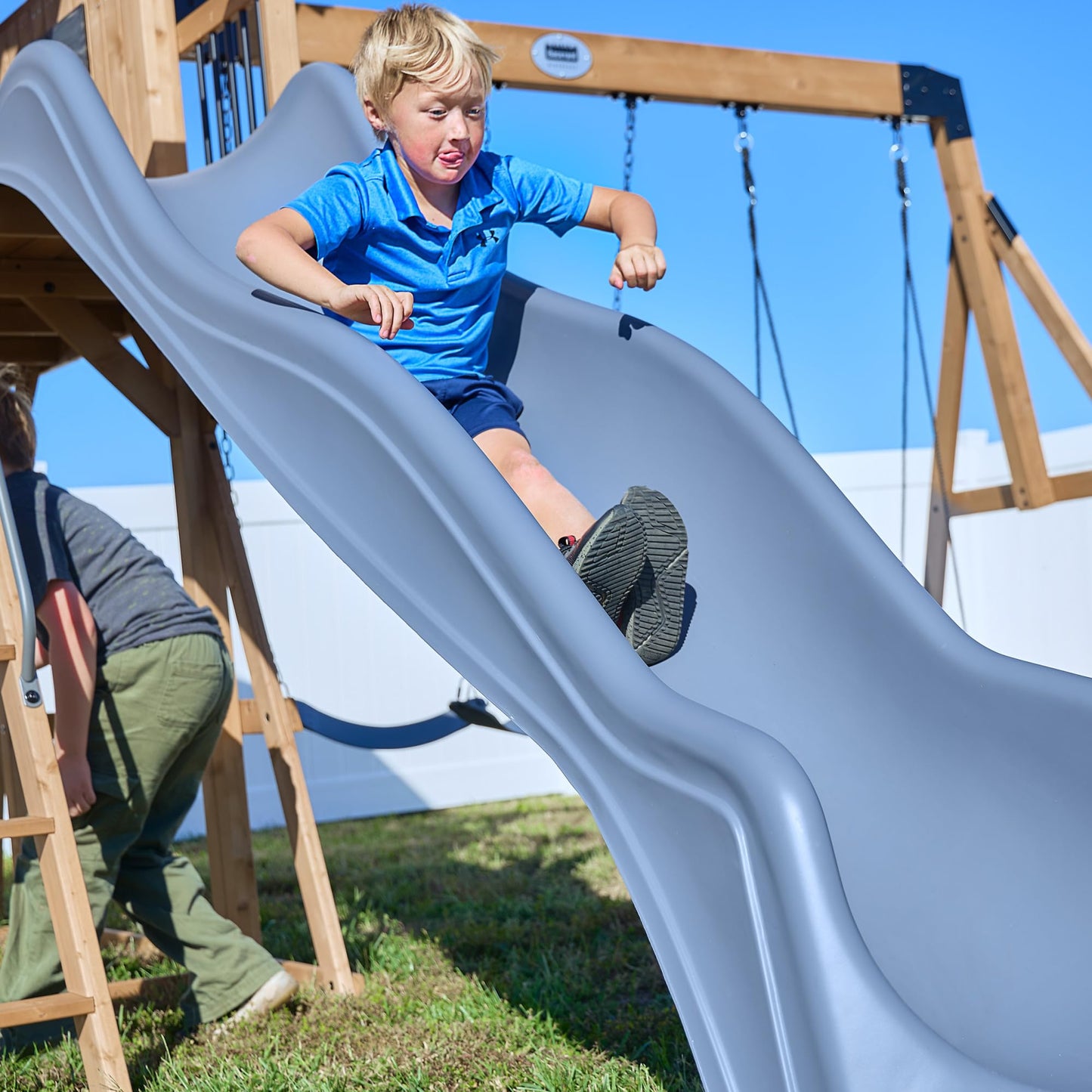 Backyard Discovery Dover Bay Spruce Wood Swing Set with Spiral Tube Slide, Wave Slide, Clubhouse, Rock Wall, Belt Swings, Step Ladder, Toy Telescope, Chalkboard, Outdoor Playset