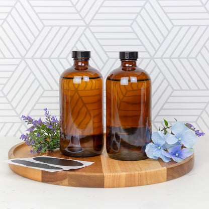 Cornucopia Brands 16oz Amber Glass Bottles with Reusable Chalk Labels and Lids (Pack of 2) Refillable Brown Boston Round Bottles, with Black 28-400 Caps