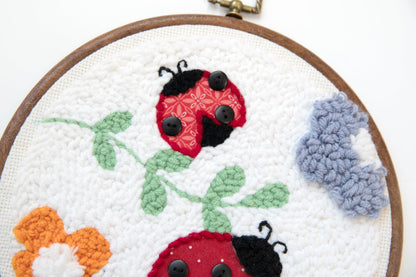 Kimberbell Punch Needle Kit – Bugs & Blooms - Complete DIY Embroidery Kit with Tool, Monks Cloth, Yarn, Appliqué Fabric & Frame – Ladybug & Floral Punch Needle Design for Handmade Gifts & Décor