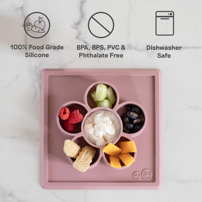 ezpz Mini Play Mat for Baby + Toddler (Blush) - 6 Months+ - Suction Plate with Flower Compartments for Crafts, Painting, Sorting, Snack Time - Promotes Pincer Grip