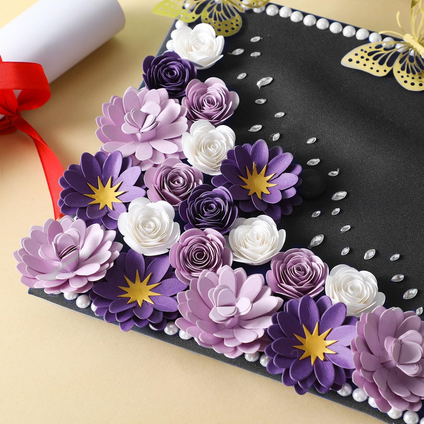 MotiMind 39 Pcs Graduation Cap Decorations Kit Including 25 Rose Heads Paper Flowers 12 3D Gold Butterfly Stickers 1 Self Adhesive Pearl 1 Rhinestones Stickers for DIY Graduation Cap(Purple)