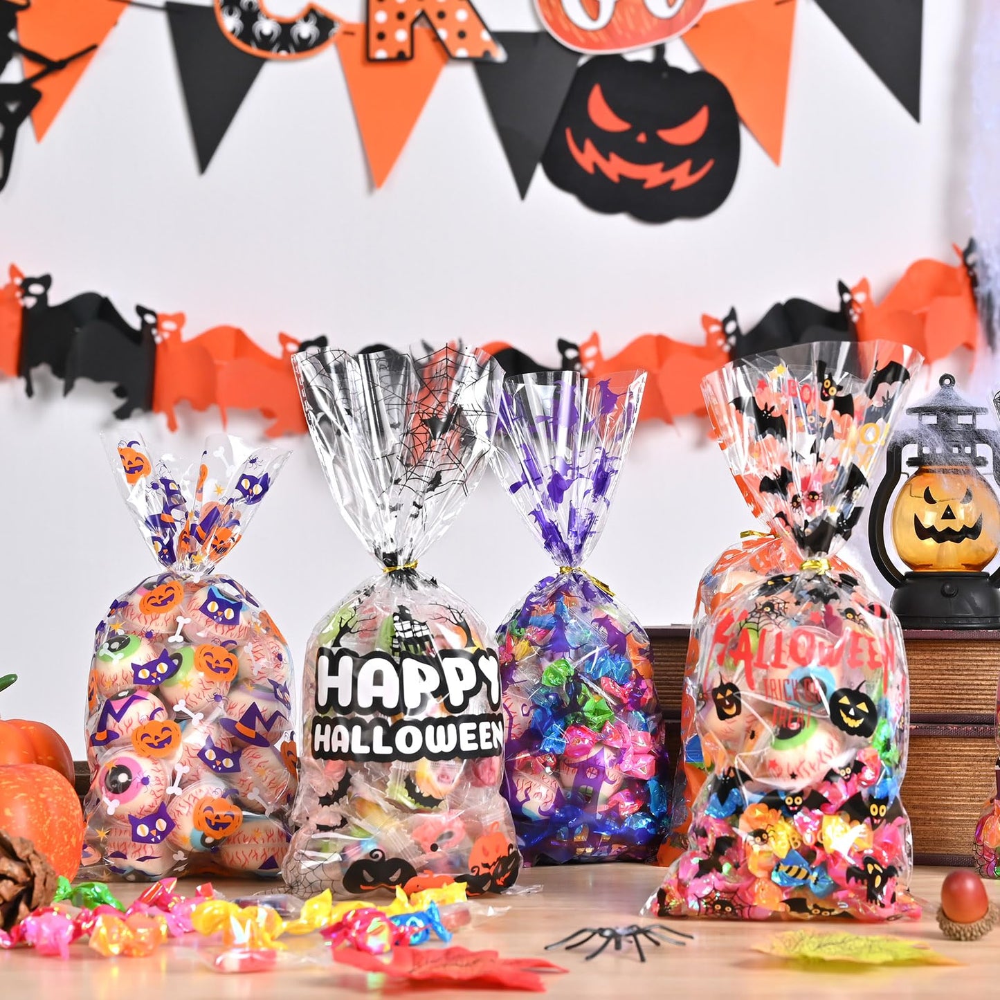 AhfuLife 200PCS Halloween Cellophane Treat Bags, 8 Designs Halloween Clear Candy Bags with Twist Ties for Treat or Treating, Snack Goodie Bags for Party Supplies Favors