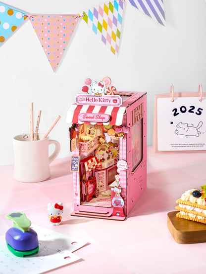 Hands Craft Hello Kitty Sweet Shop Book Nook Kit – Official Sanrio DIY Miniature Shelf Insert with Touch LED – 149-Piece 3D Puzzle for Adults & Teens – Kawaii Decor, Collectible Diorama Craft Kit