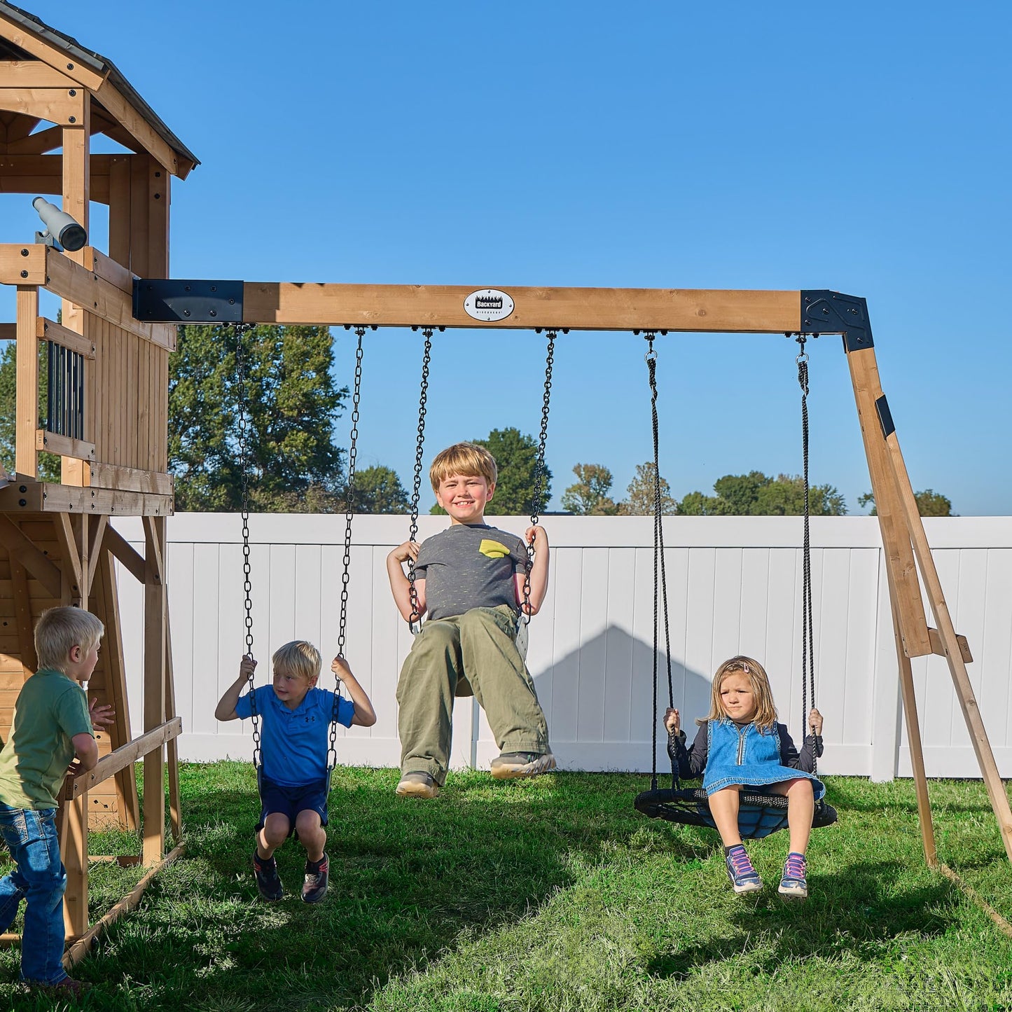 Backyard Discovery Dover Bay Spruce Wood Swing Set with Wave Slide, Clubhouse, Monkey Bars, Rock Wall, Belt Swings, Step Ladder, Toy Telescope, Chalkboard, Outdoor Playset