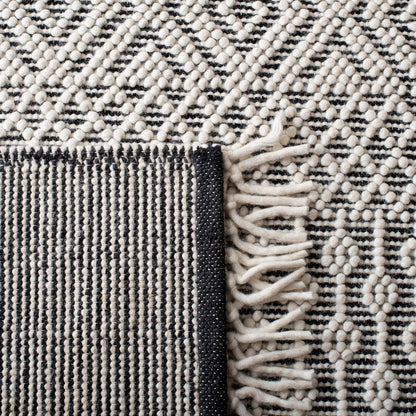 SAFAVIEH Natura Collection Area Rug - 9' x 12', Ivory & Black, Handmade Moroccan Boho Wool Fringe, Ideal for High Traffic Areas in Living Room, Bedroom (NAT852Z)
