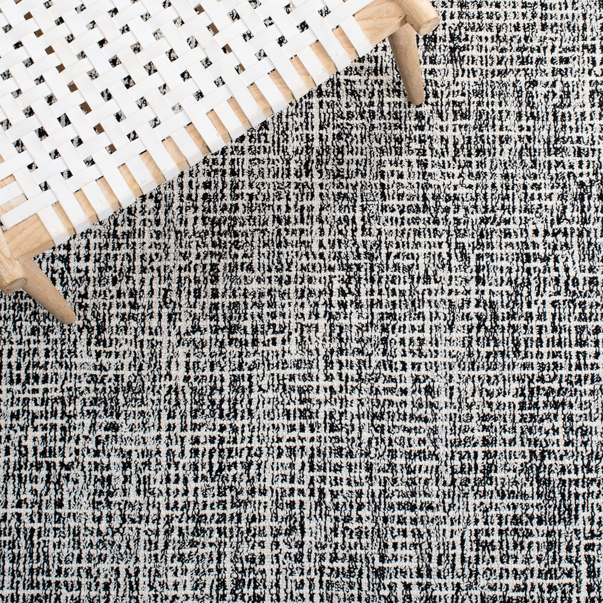 SAFAVIEH Abstract Collection Area Rug - 9' x 12', Black & Ivory, Handmade Wool, Ideal for High Traffic Areas in Living Room, Bedroom (ABT468Z)
